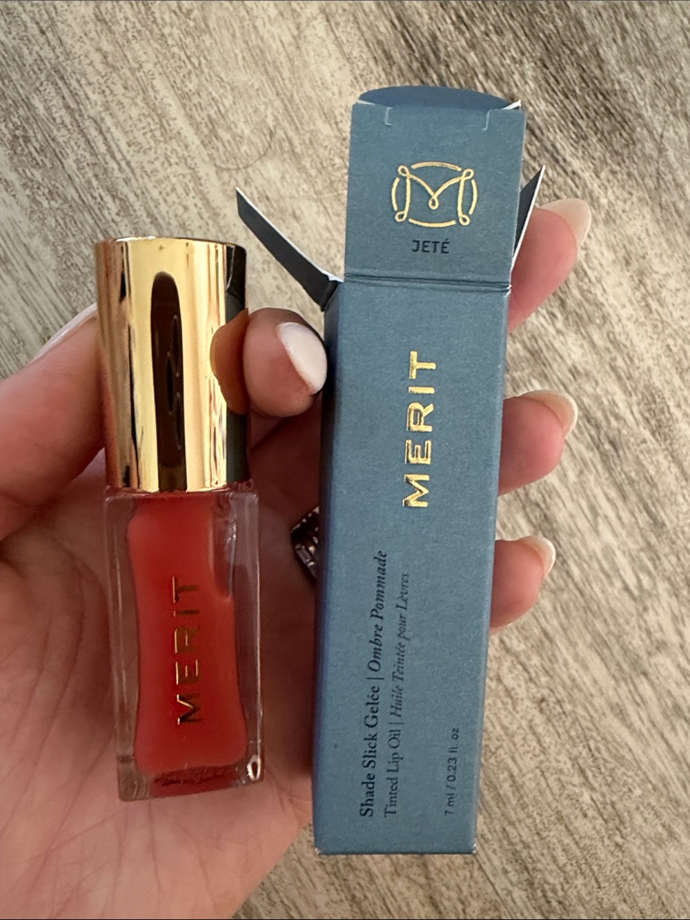 Merit Jeté Lip Shine — Warm Coral-Peach